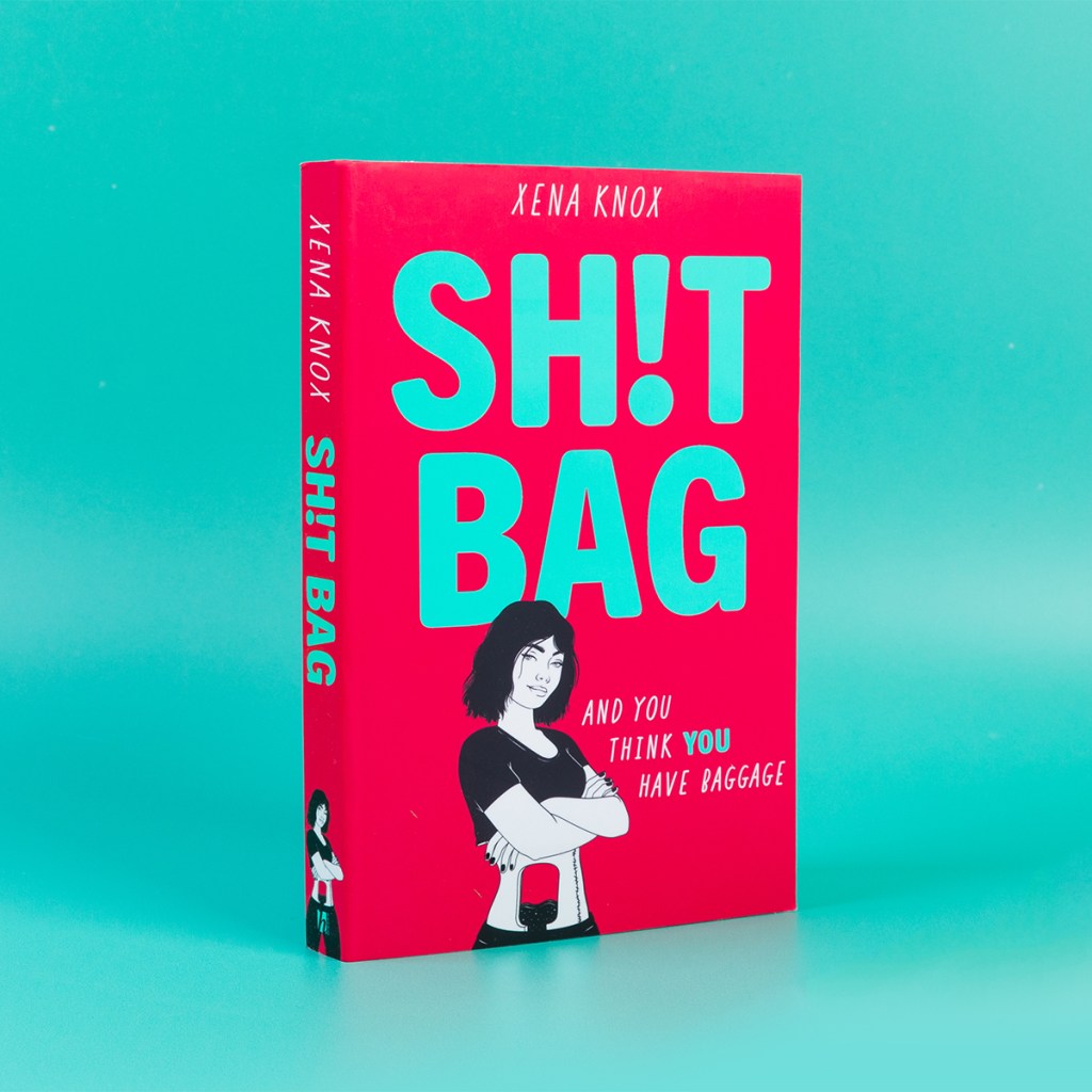 SH!TBAG - hot pink book on a turquoise background