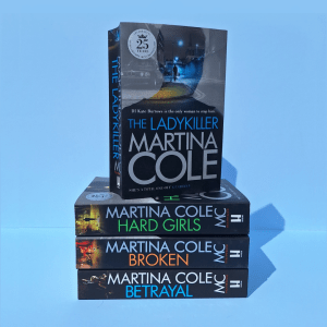 Photograph of a stack of Martina Cole paperback books, including The Ladykiller, Hard Girls, Broken and Betrayal